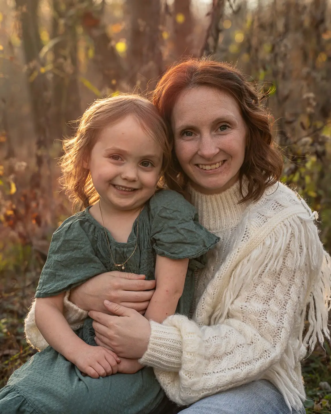 Mother and young daughter at golden hour